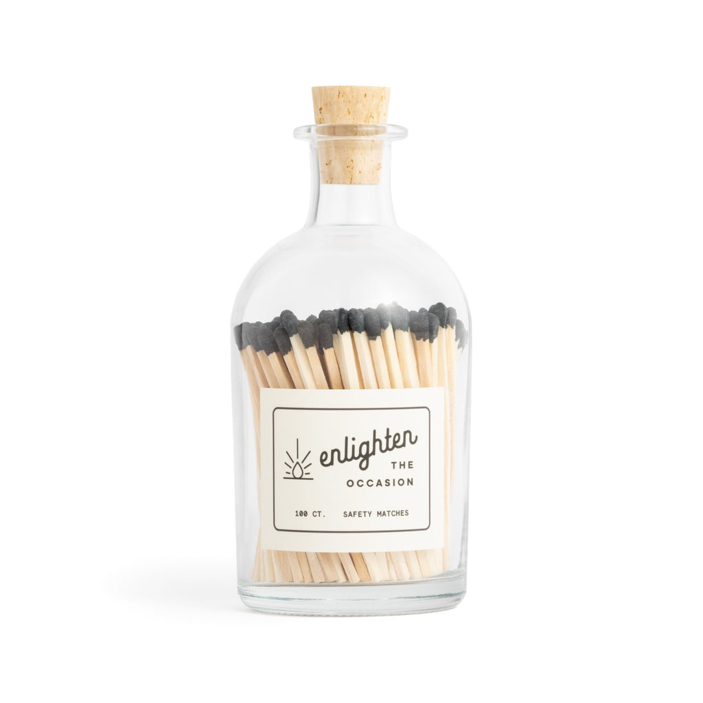 black tip wood matchsticks in corked apothecary jar with match striker