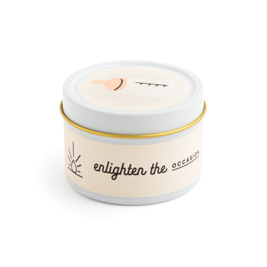 oatmeal milk and honey scented candle with a set of colorful wood matches