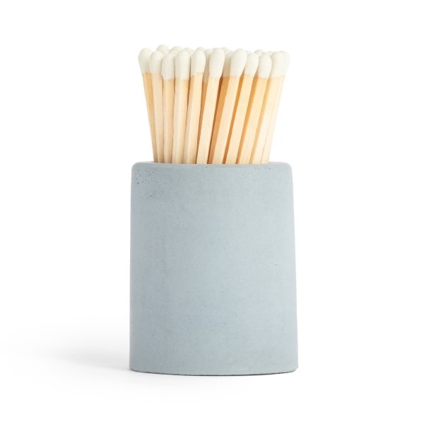 blue concrete vessel with matches