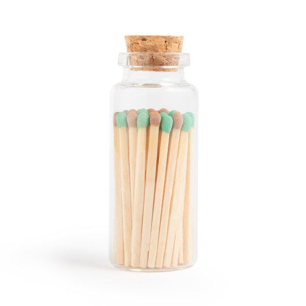 chocolate mint matchsticks in corked vial with match striker