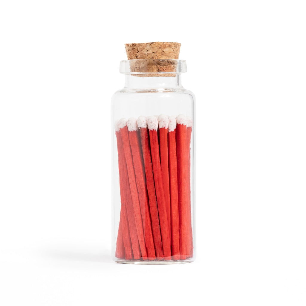 red velvet cake color tip wood matches in corked jar with match striker